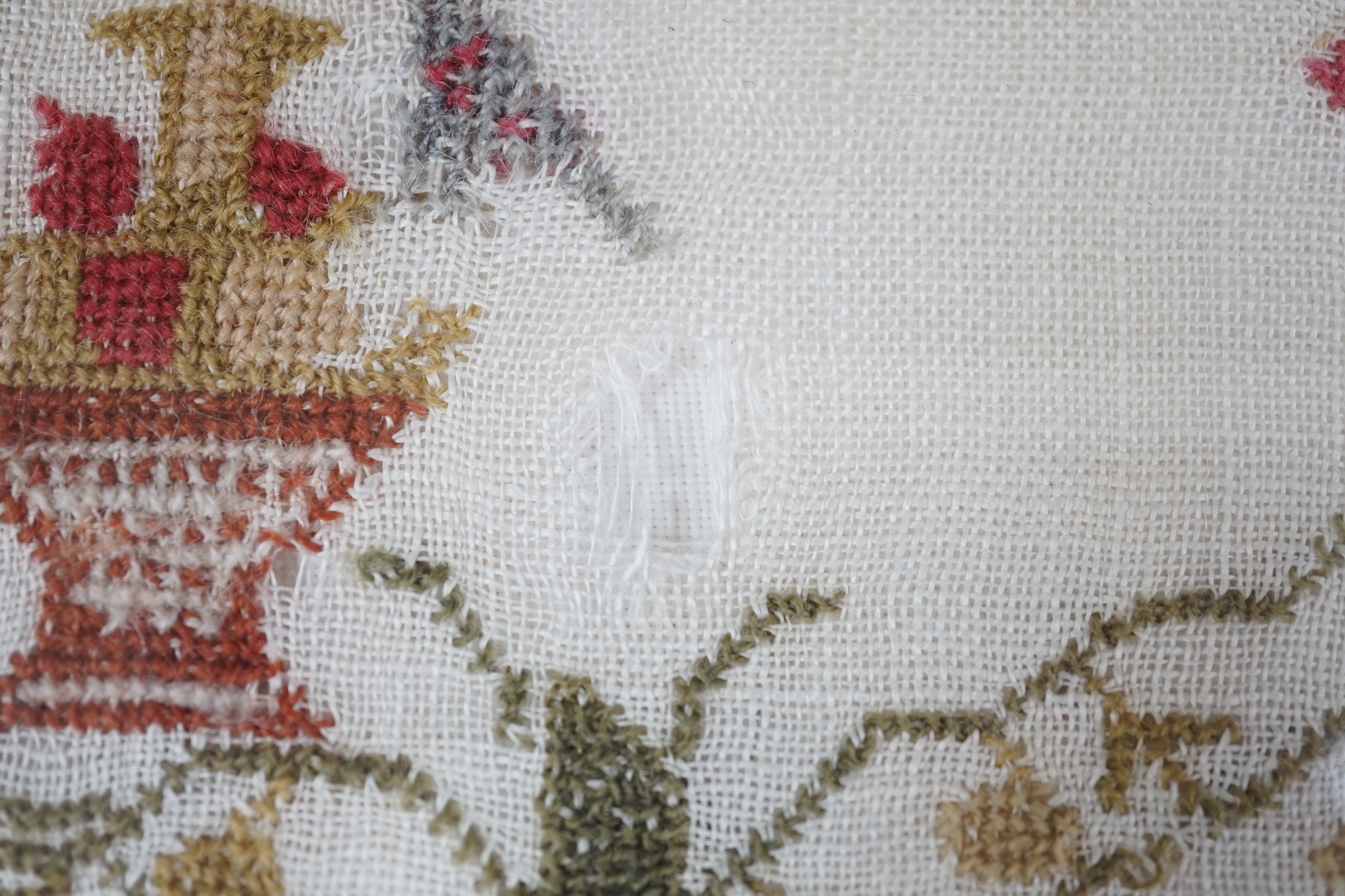 A framed 19th century sampler, 44cm sq excl frame